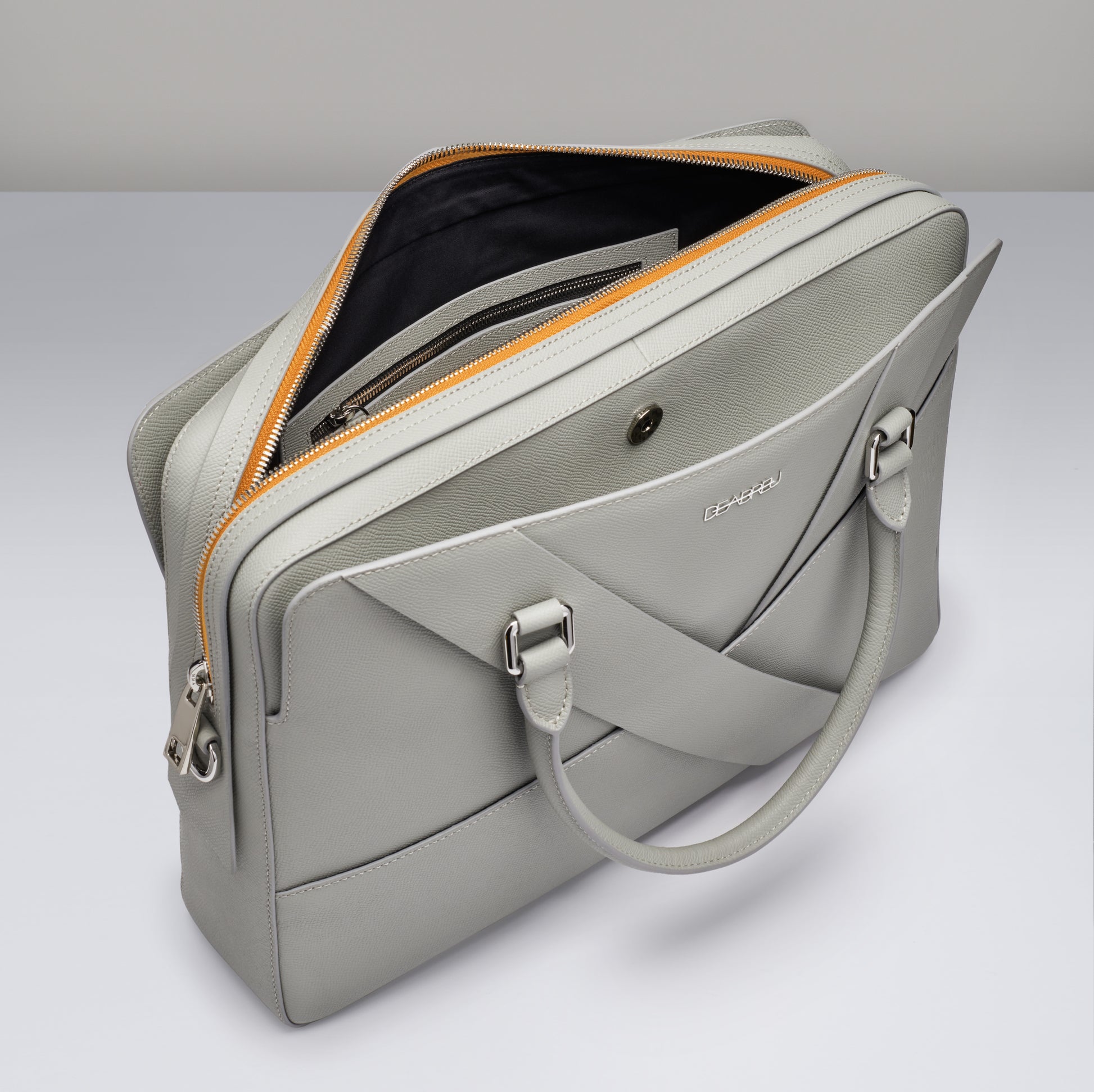 Interior of Deabreu Italy Gray Saffiano Leather Business Briefcase showing laptop compartment and pockets