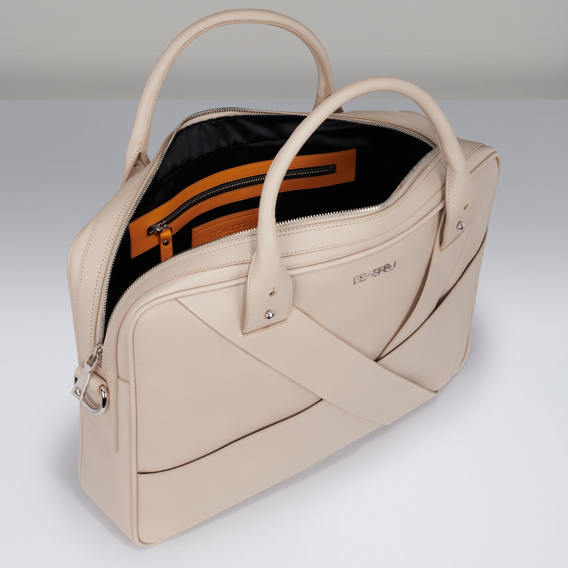 Interior of Deabreu Italy Taupe Calf Leather Business Briefcase showing laptop compartment and pockets