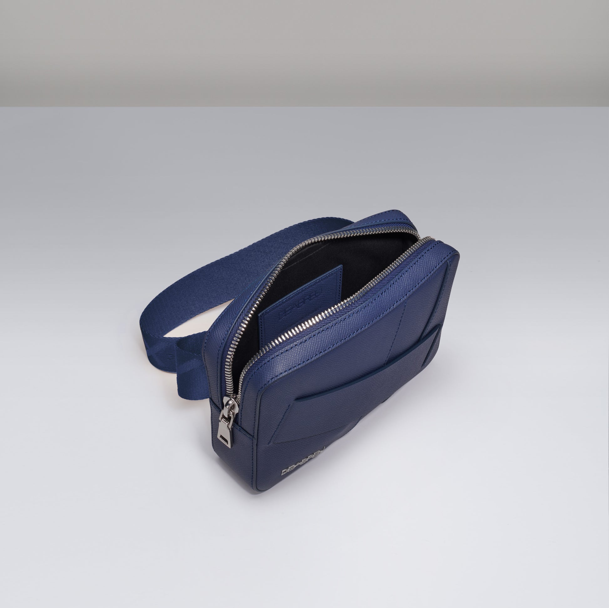 Interior of Deabreu Italy Blue Saffiano Leather Crossbody Bag showing compartments