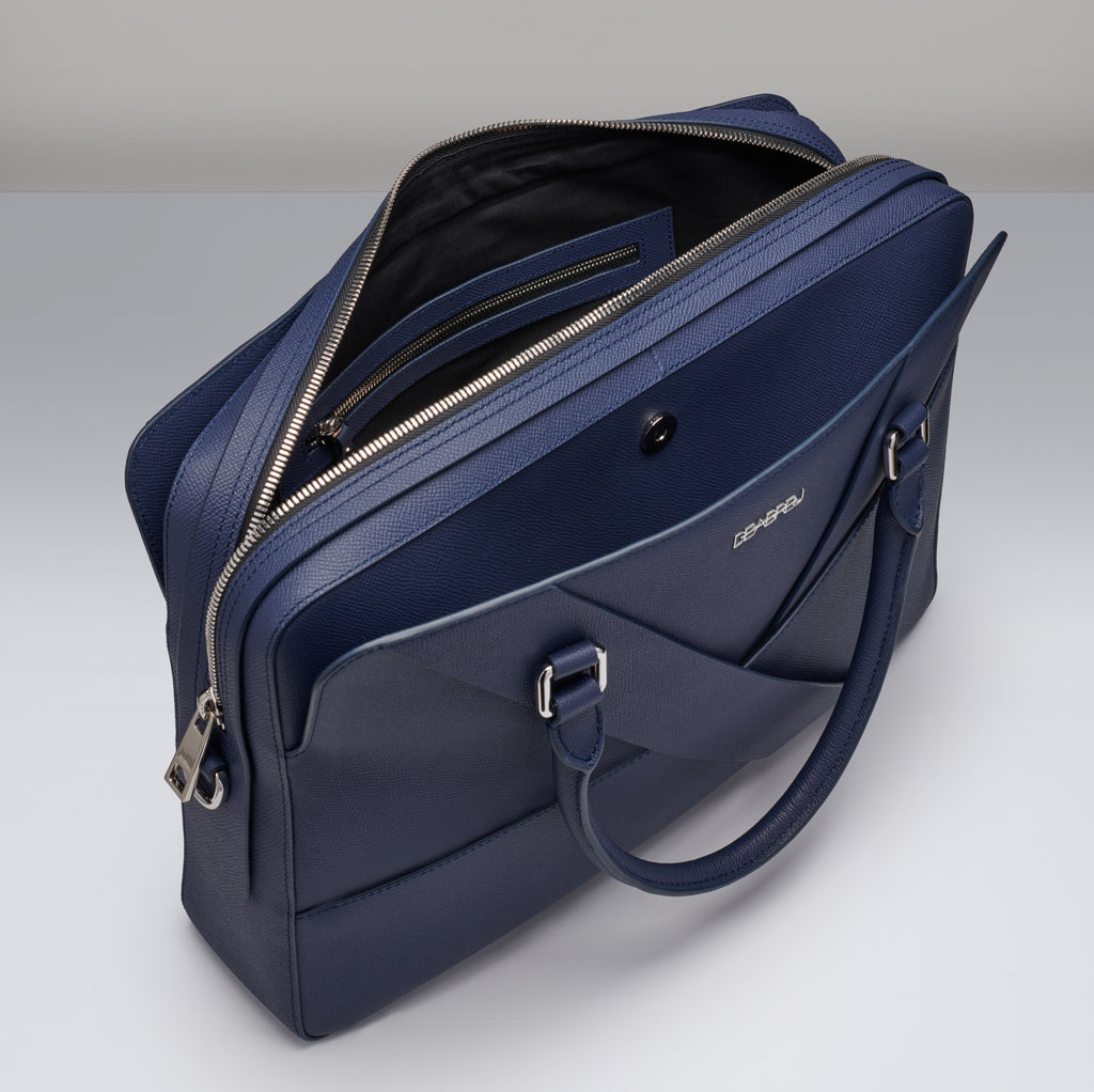 Interior of Deabreu Italy Blue Saffiano Leather Briefcase showing laptop compartment and pockets