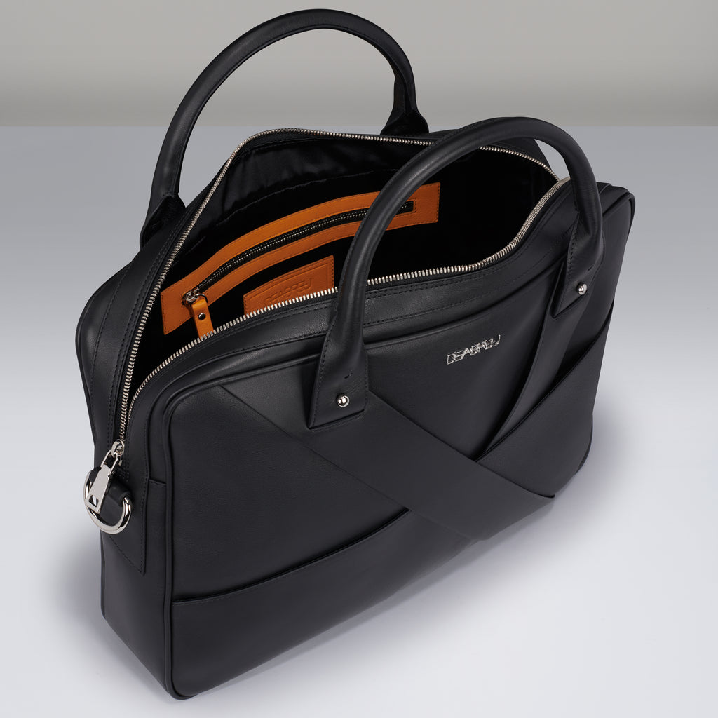 Interior of Deabreu Italy Black Calf Leather Business Briefcase showing laptop compartment and pockets