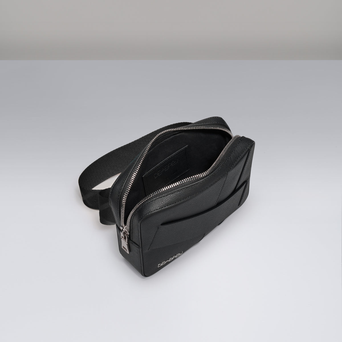 Interior of Deabreu Italy Black Saffiano Leather Crossbody Bag showing compartments