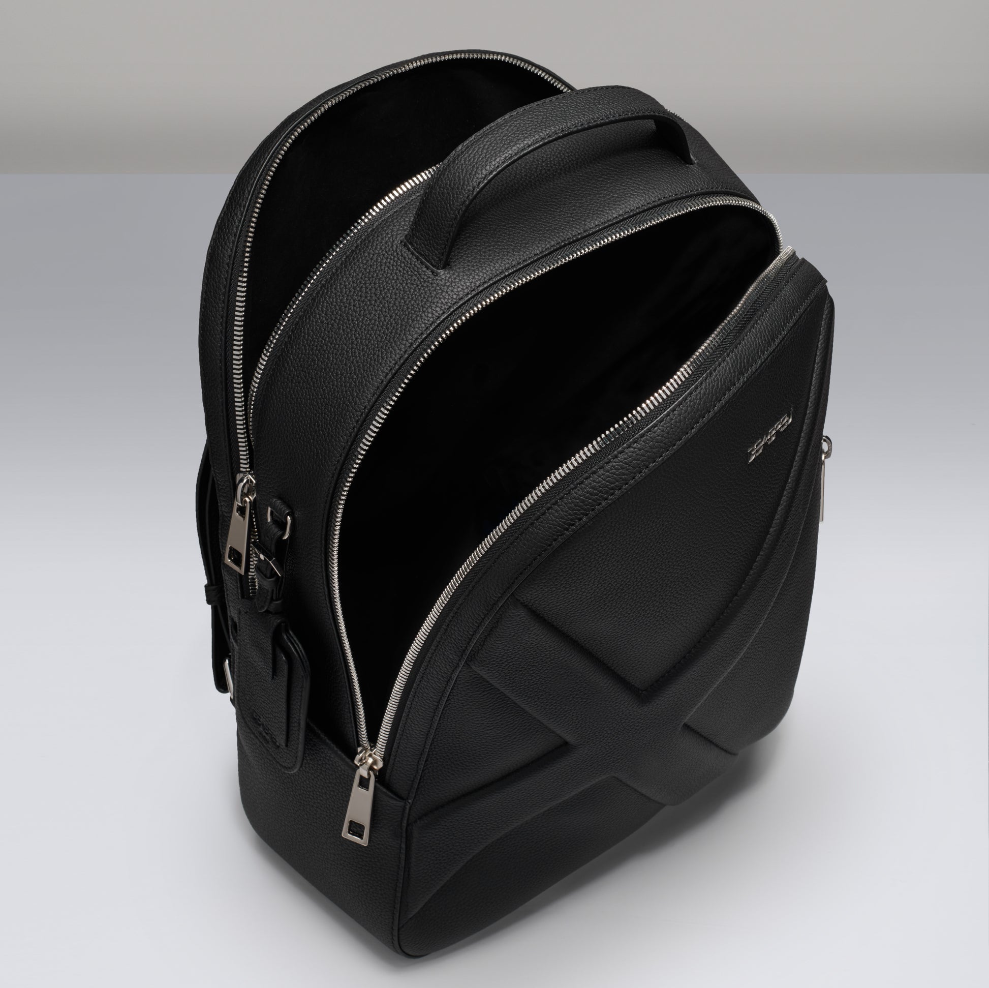Interior of Deabreu Italy City Back Pack showing laptop compartment and main storage